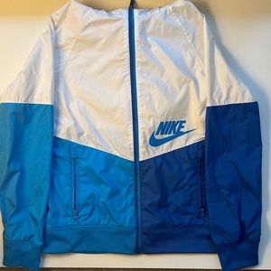 Nike  windbreaker. Boys. Unisex. Size medium (10-12). Blue and White.